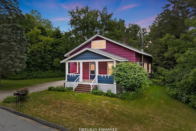 25 Foch St, Lewiston, ME 04240 - view of front of property featuring a porch, a yard, and dirt driveway