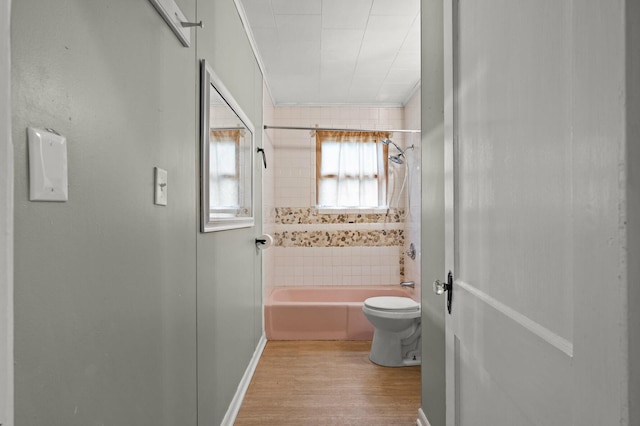 25 Foch St, Lewiston, ME 04240 - bathroom with wood finished floors, bathtub / shower combination, and ornamental molding