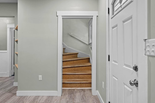 25 Foch St, Lewiston, ME 04240 - stairs featuring wood finished floors and baseboards