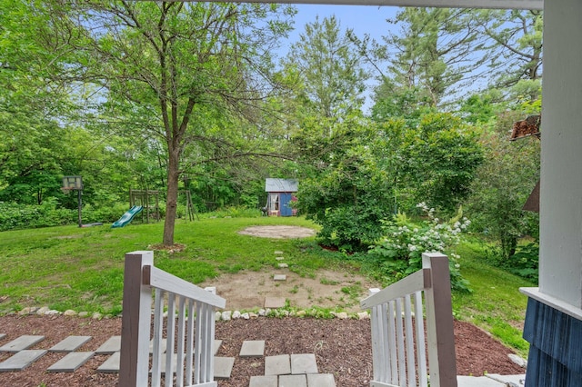 25 Foch St, Lewiston, ME 04240 - view of grassy yard with a playground