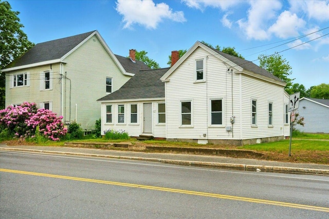 219 Lisbon St, Lisbon, ME 04250 - traditional-style house with a chimney
