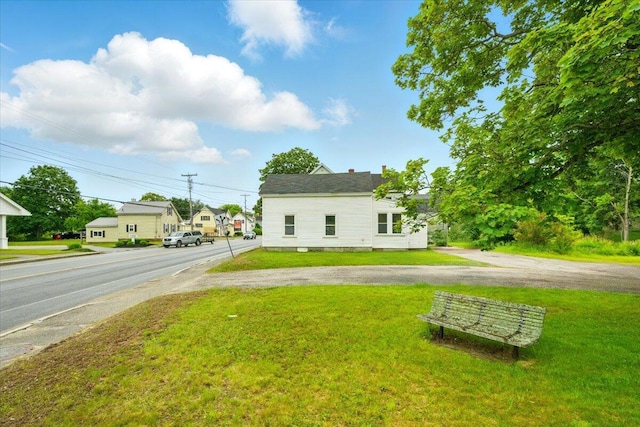 219 Lisbon St, Lisbon, ME 04250 - view of home's exterior with a yard