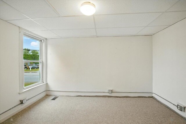 219 Lisbon St, Lisbon, ME 04250 - carpeted empty room with a drop ceiling
