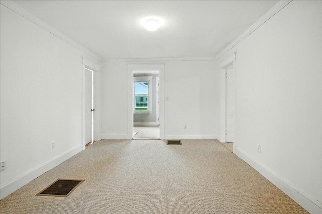 219 Lisbon St, Lisbon, ME 04250 - unfurnished room with light carpet and ornamental molding