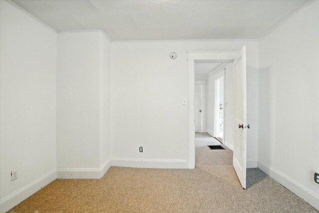219 Lisbon St, Lisbon, ME 04250 - spare room with light colored carpet and ornamental molding