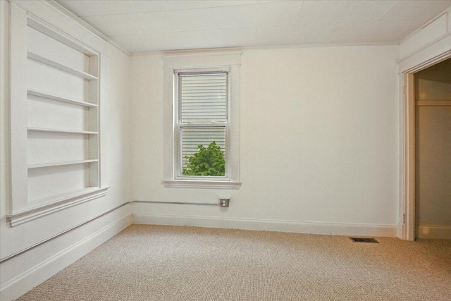 219 Lisbon St, Lisbon, ME 04250 - unfurnished bedroom with light carpet and ornamental molding