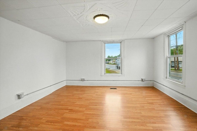 219 Lisbon St, Lisbon, ME 04250 - empty room featuring plenty of natural light and light wood-style floors