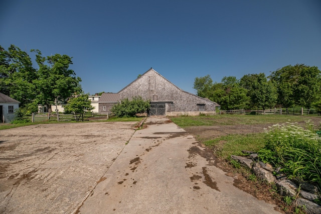 1785 Alna Rd, Alna, ME 04535 - view of front facade featuring a barn, an outdoor structure, and a metal roof