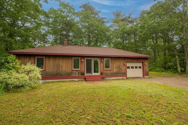 404 Lower Round Pond Rd, Bristol, ME 04539 - ranch-style home featuring a front yard, a garage, driveway, and roof with shingles
