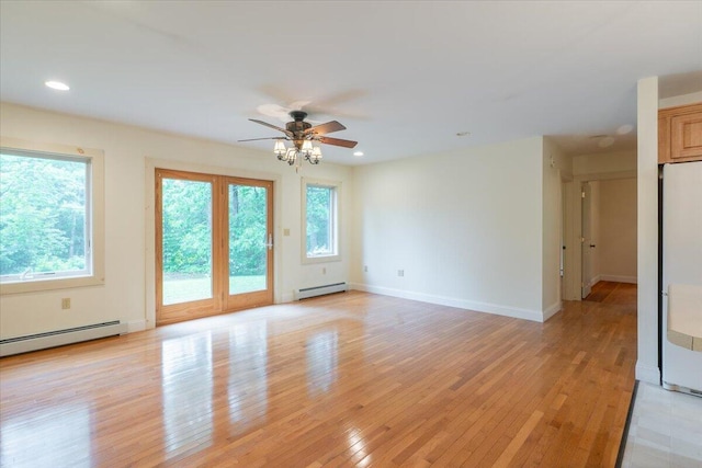 404 Lower Round Pond Rd, Bristol, ME 04539 - empty room featuring a baseboard radiator, a ceiling fan, light wood-style flooring, recessed lighting, and baseboard heating