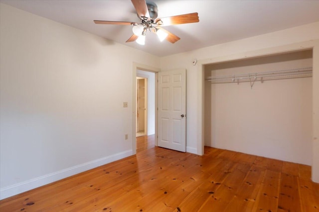404 Lower Round Pond Rd, Bristol, ME 04539 - unfurnished bedroom featuring light wood finished floors, a closet, and ceiling fan