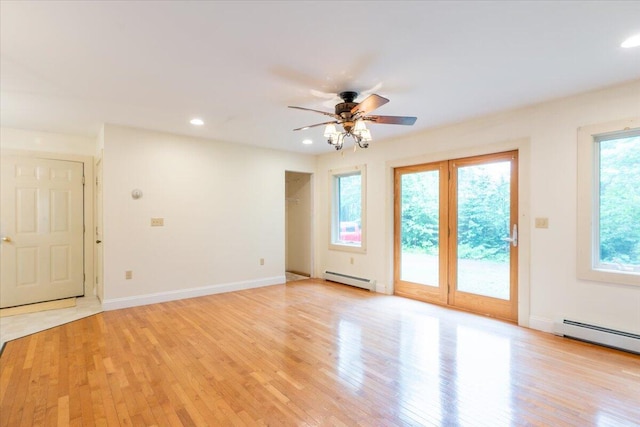404 Lower Round Pond Rd, Bristol, ME 04539 - empty room with a baseboard radiator, light wood-style floors, ceiling fan, and recessed lighting