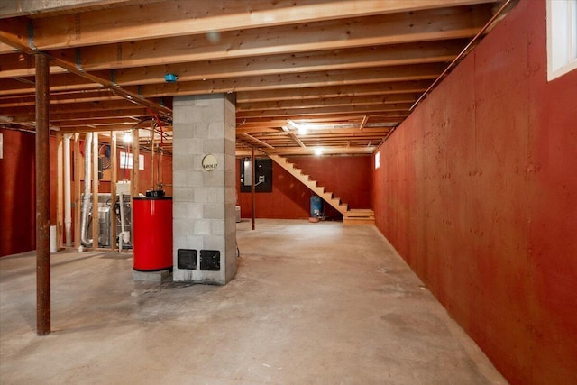 404 Lower Round Pond Rd, Bristol, ME 04539 - unfinished below grade area featuring stairs and water heater