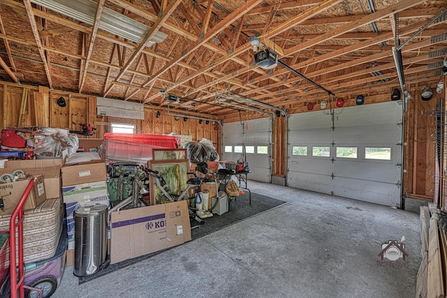 821 China Rd, Albion, ME 04910 - garage featuring a garage door opener