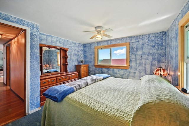 821 China Rd, Albion, ME 04910 - carpeted bedroom featuring wallpapered walls and ceiling fan