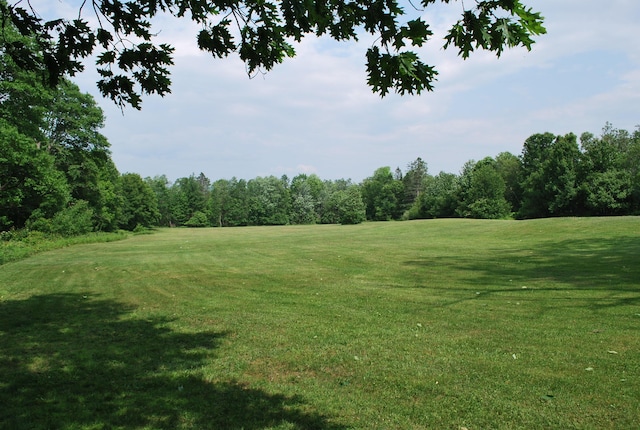 180 Chadbourne Rd, Harmony, ME 04942 - view of grassy yard with view of golf course
