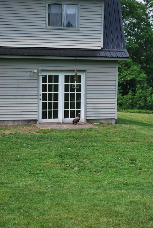 180 Chadbourne Rd, Harmony, ME 04942 - back of property featuring a metal roof and a yard