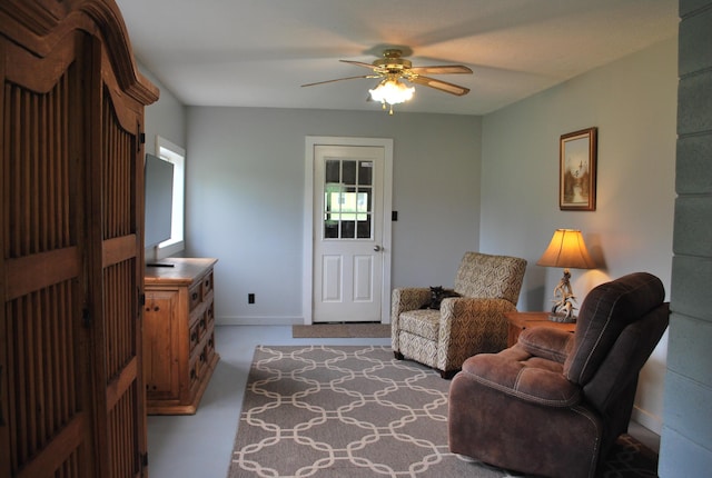 180 Chadbourne Rd, Harmony, ME 04942 - living room with ceiling fan and carpet floors