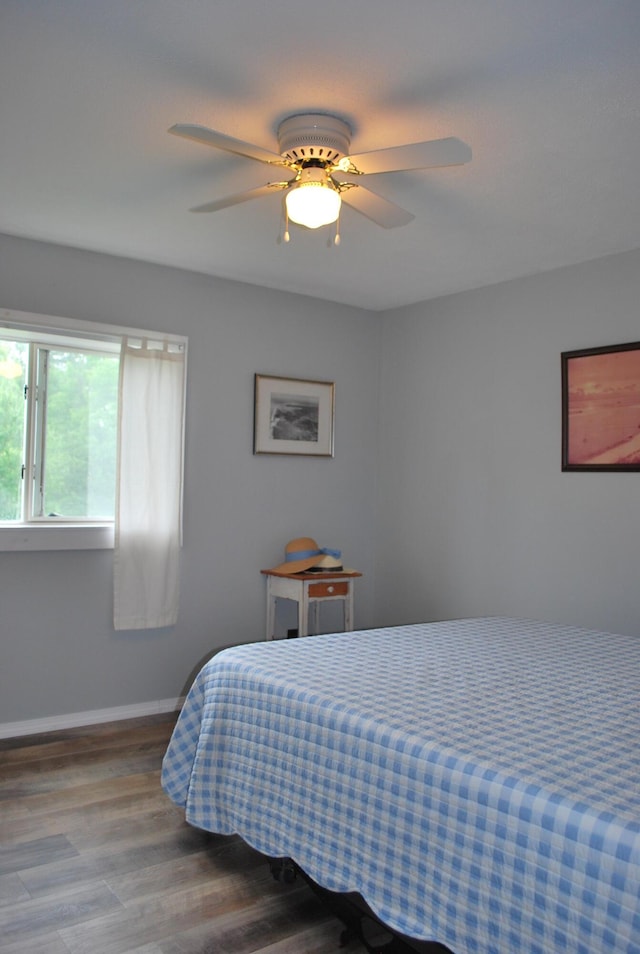 180 Chadbourne Rd, Harmony, ME 04942 - bedroom with wood finished floors and a ceiling fan