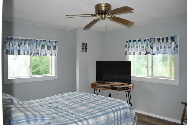180 Chadbourne Rd, Harmony, ME 04942 - bedroom with wood finished floors and a ceiling fan