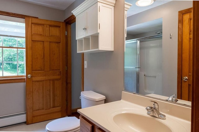 3350 Middle Rd, Sidney, ME 04330 - bathroom with a baseboard heating unit, vanity, and a shower with door