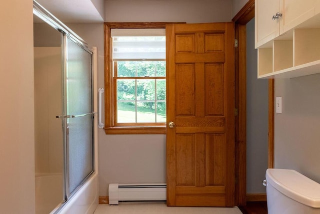 3350 Middle Rd, Sidney, ME 04330 - bathroom with a baseboard radiator and enclosed tub / shower combo