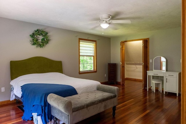 3350 Middle Rd, Sidney, ME 04330 - bedroom with wood-type flooring, ceiling fan, a spacious closet, and a closet