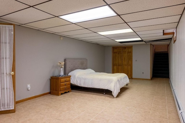 3350 Middle Rd, Sidney, ME 04330 - bedroom with a baseboard heating unit and a drop ceiling