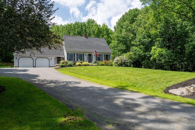 3350 Middle Rd, Sidney, ME 04330 - view of front of home with a garage, driveway, a front yard, and a chimney