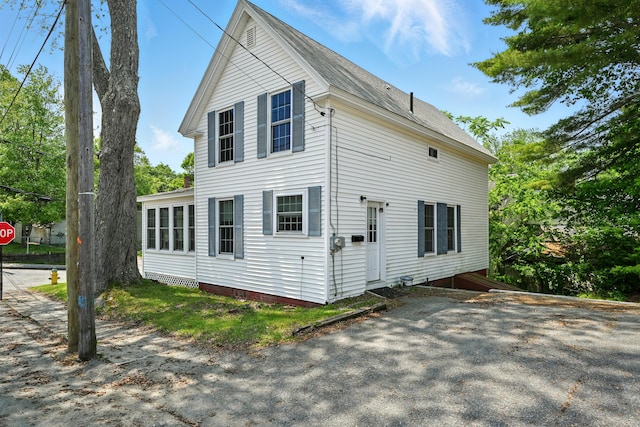 14 Maple St, Lisbon, ME 04252 - view of side of home featuring a shingled roof