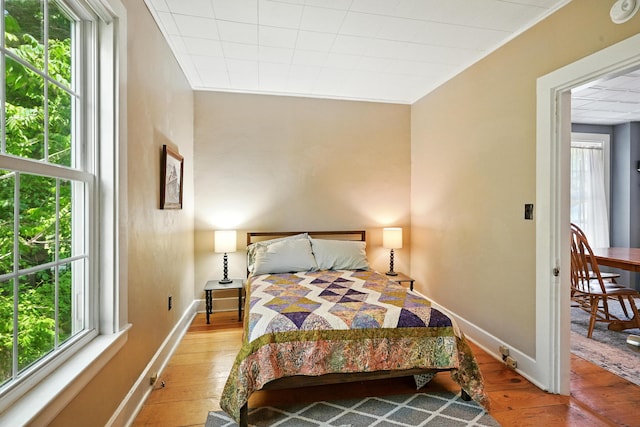 14 Maple St, Lisbon, ME 04252 - bedroom featuring hardwood / wood-style floors and multiple windows