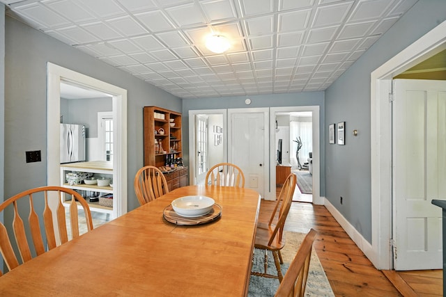 14 Maple St, Lisbon, ME 04252 - dining room featuring light wood finished floors and baseboards