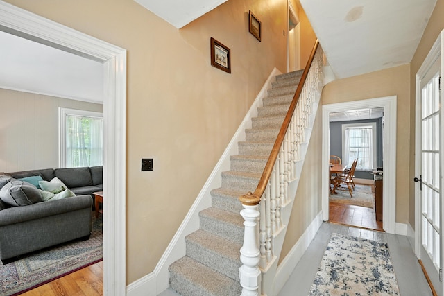 14 Maple St, Lisbon, ME 04252 - staircase featuring healthy amount of natural light and wood finished floors
