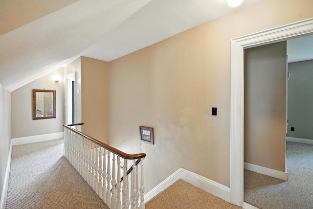 14 Maple St, Lisbon, ME 04252 - hallway featuring an upstairs landing, carpet floors, and vaulted ceiling