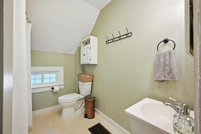 14 Maple St, Lisbon, ME 04252 - bathroom featuring vaulted ceiling and toilet