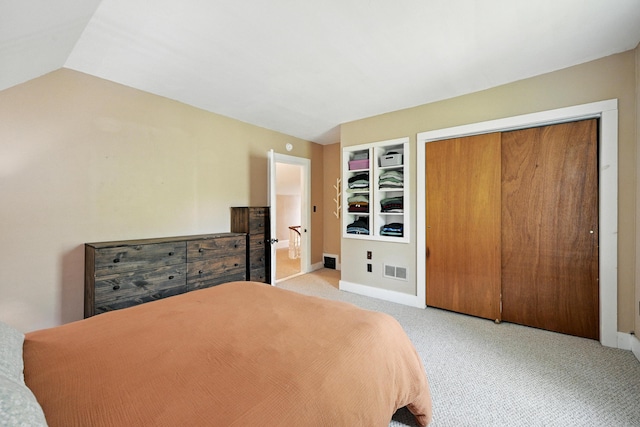 14 Maple St, Lisbon, ME 04252 - bedroom with carpet flooring, a closet, ensuite bath, and lofted ceiling