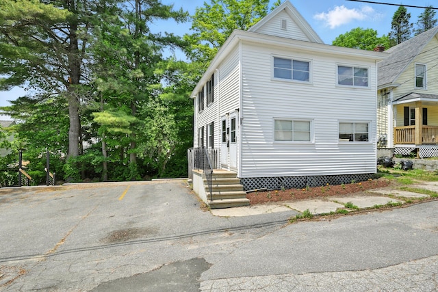 14 Maple St, Lisbon, ME 04252 - view of side of home with uncovered parking