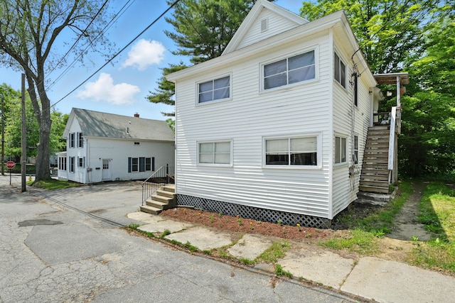 14 Maple St, Lisbon, ME 04252 - view of front of property featuring stairs and driveway