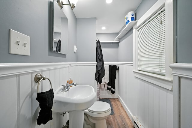 14 Maple St, Lisbon, ME 04252 - bathroom featuring wood finished floors, a wainscoted wall, and recessed lighting