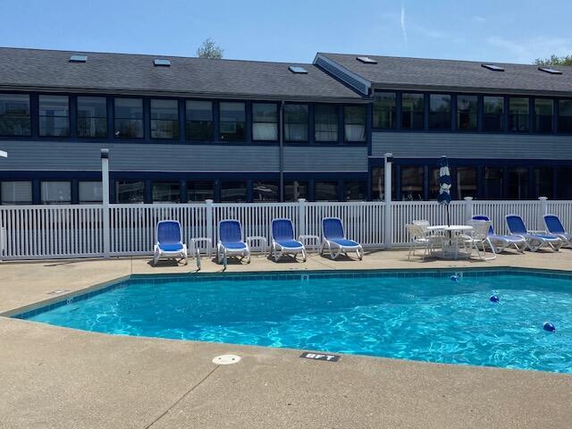 1072 Post Rd Unit 102, Wells, ME 04090 - community pool featuring a patio area