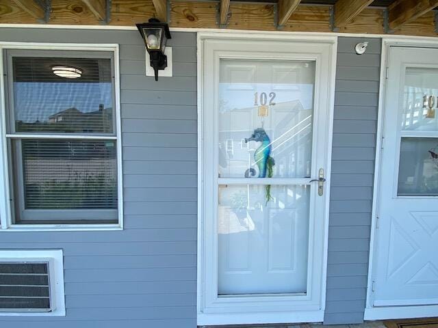 1072 Post Rd Unit 102, Wells, ME 04090 - entrance to property featuring a wall unit AC