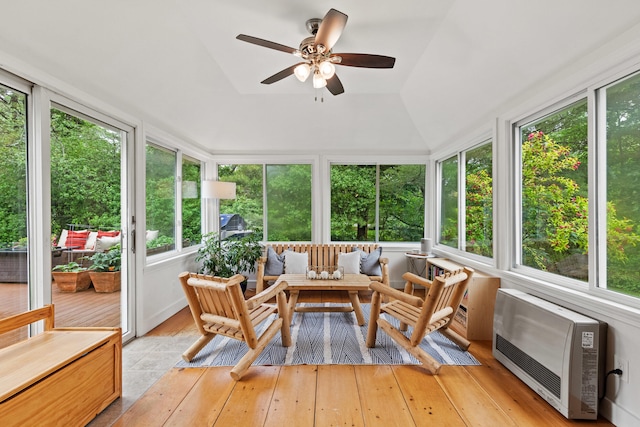 526 E Main St, Yarmouth, ME 04096 - sunroom / solarium with a wooden deck, wood-type flooring, vaulted ceiling, and heating unit