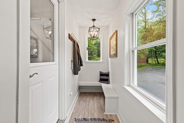 526 E Main St, Yarmouth, ME 04096 - doorway featuring a chandelier and light wood-style flooring