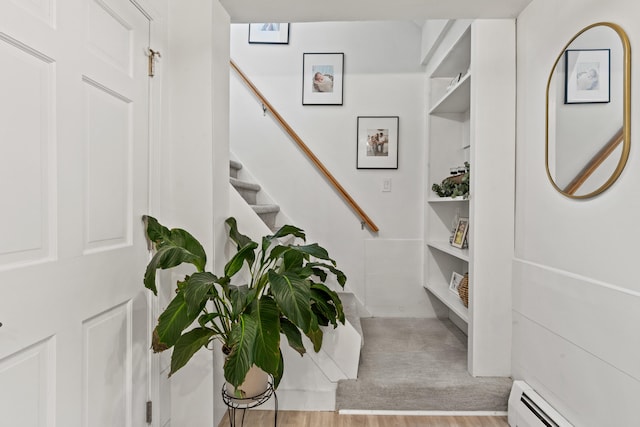 526 E Main St, Yarmouth, ME 04096 - stairs with a baseboard radiator and wood finished floors