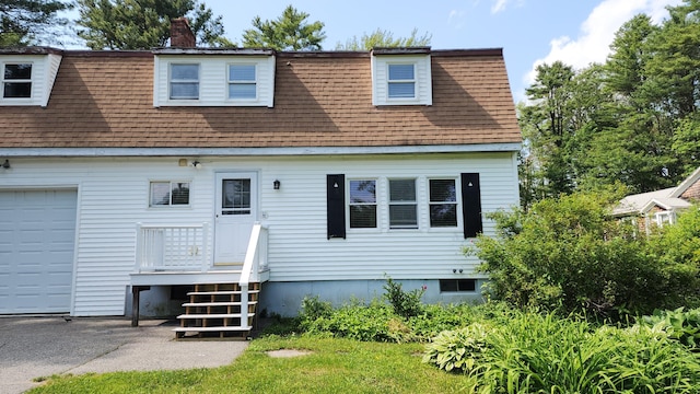 50 George Wright Rd, Woolwich, ME 04579 - view of front facade with a shingled roof, a chimney, and an attached garage