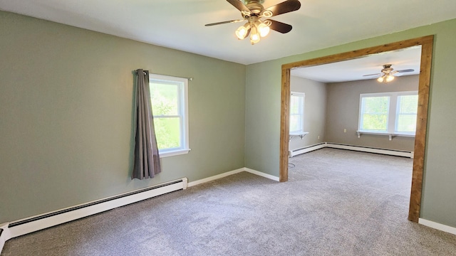 50 George Wright Rd, Woolwich, ME 04579 - carpeted spare room with a baseboard radiator and a ceiling fan