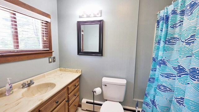 50 George Wright Rd, Woolwich, ME 04579 - bathroom with vanity, a baseboard heating unit, and a shower with curtain