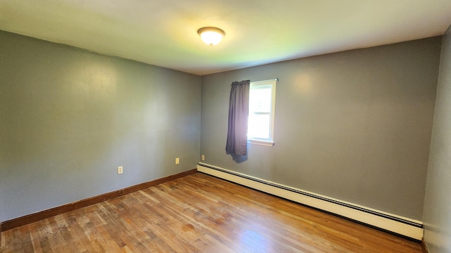 50 George Wright Rd, Woolwich, ME 04579 - unfurnished room featuring baseboard heating and wood finished floors