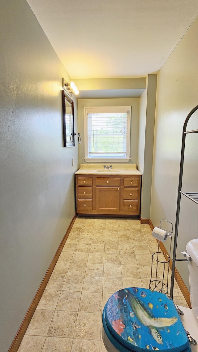 50 George Wright Rd, Woolwich, ME 04579 - bathroom featuring baseboards and a sink