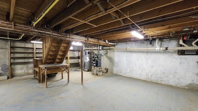 50 George Wright Rd, Woolwich, ME 04579 - unfinished below grade area with water heater and a heating unit